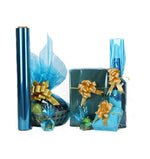 Gift basket wrapped in blue iridescent cellophane film