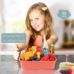 Pack of toddler food forks arranged beside a healthy school tiffin box containing diced fruits and sandwiches.