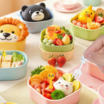 Kid friendly lunch accessory set showing different sizes of colorful animal and star shaped forks