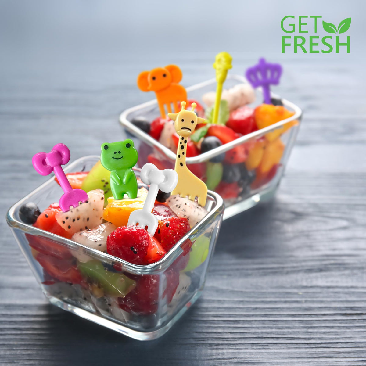 BPA-free plastic child food forks from Get Fresh inserted into healthy fruit pieces