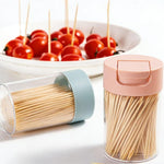 Eco friendly biodegradable wooden picks being used to serve party appetizers