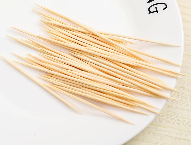 Wzrvmox airtight toothpick dispenser showing transparent base and colored lid structure