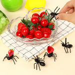 Side view of a WATMTIN reusable toothpick resembling an ant carrying a cheese block