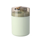 Compact pop up toothpick container displaying transparent window capacity