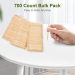 Suhfuib dual tip wood picks being used to spear fresh fruit and cheese appetizers on a party platter.