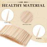 Double ended natural wood picks scattered neatly to display the uniform two point five inch length.