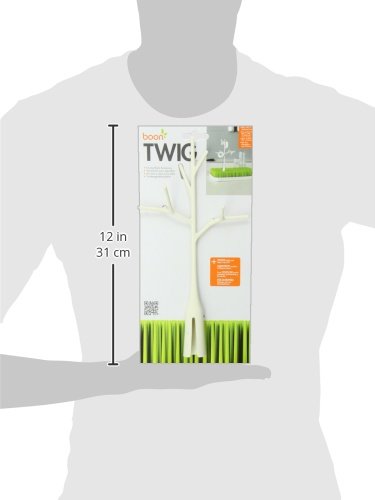 Boon Twig accessory inserted into a green drying rack
