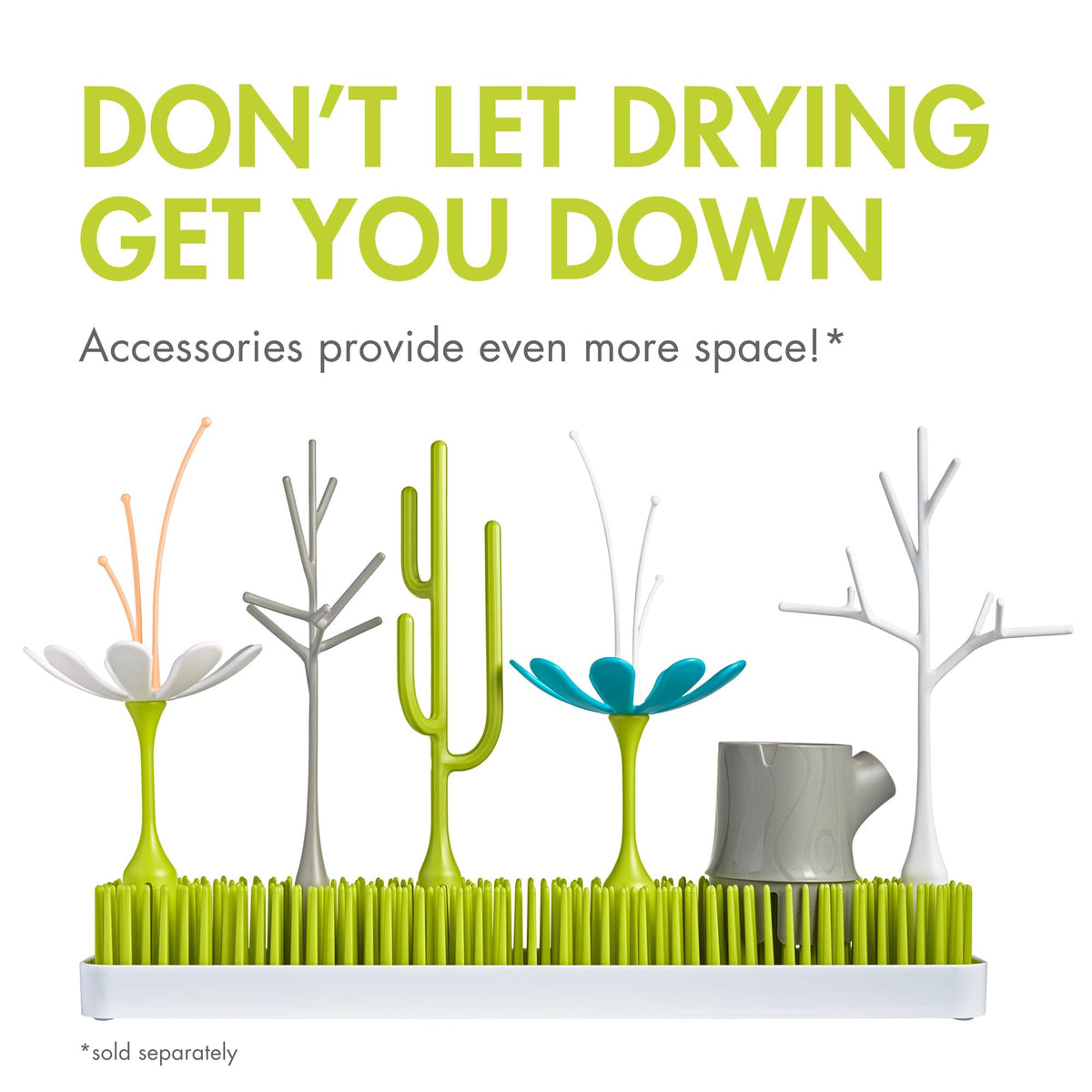 Boon Grass rack with baby bottles drying in a modern kitchen