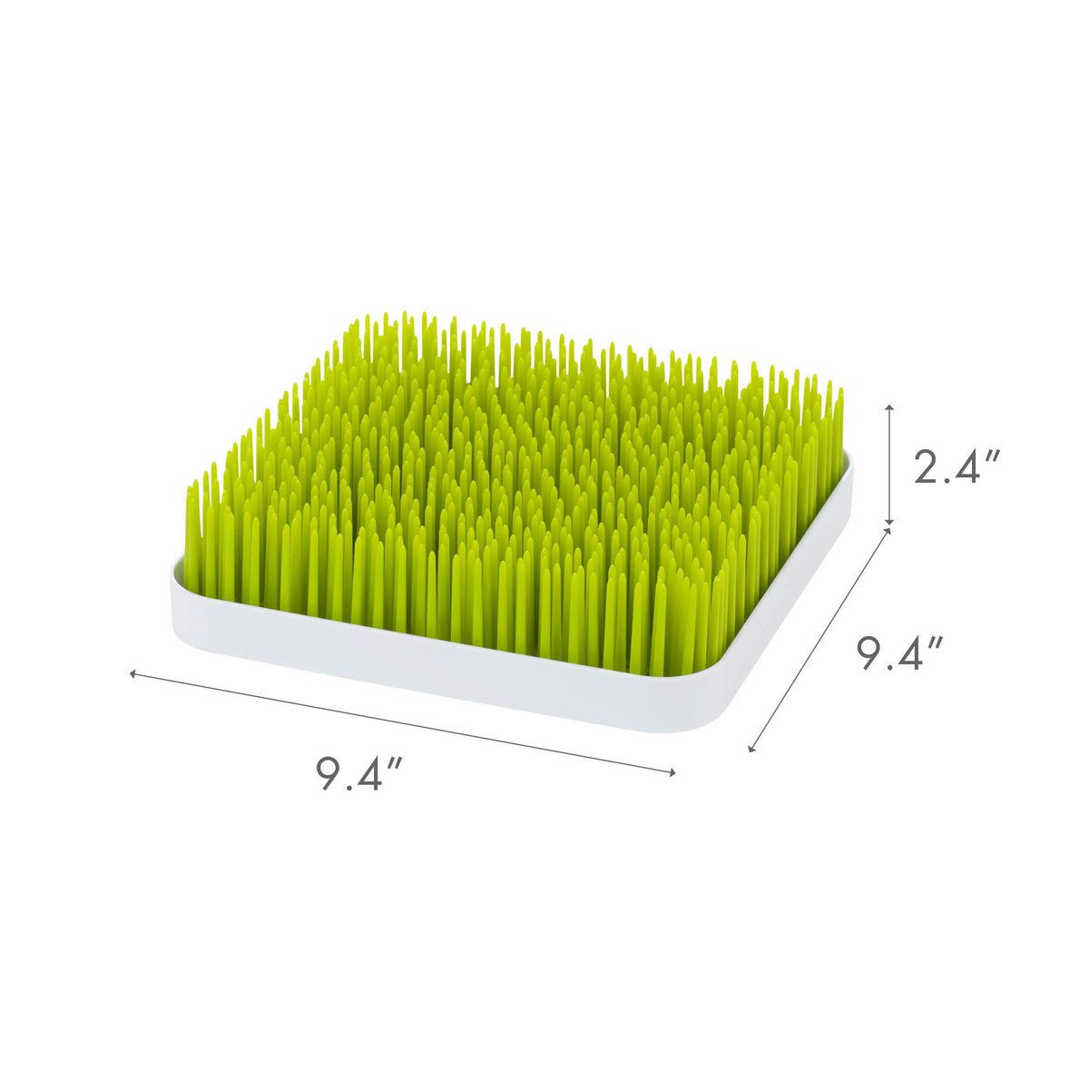 Close up of flexible green grass blades for bottle drying