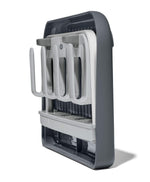 Disassembled Oxo drying rack pieces organized for storage