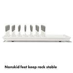 Close up of flexible silicone tipped tines on Oxo Tot rack
