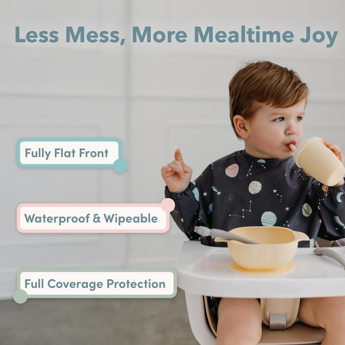 Loulou Lollipop full coverage baby feeding bib with long sleeves showing adjustable snap closures