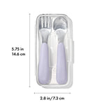 OXO Tot baby feeding travel set showing the durable stainless steel heads and pastel lilac purple grips.