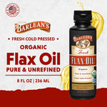 Unrefined organic flaxseed oil liquid bottle alongside fresh flax seeds showing natural ingredients.