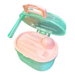 Lulyboo portable formula dispenser open lid showing included scooper and spork.