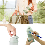 Mineral green snack and formula container packed securely inside a stylish diaper bag