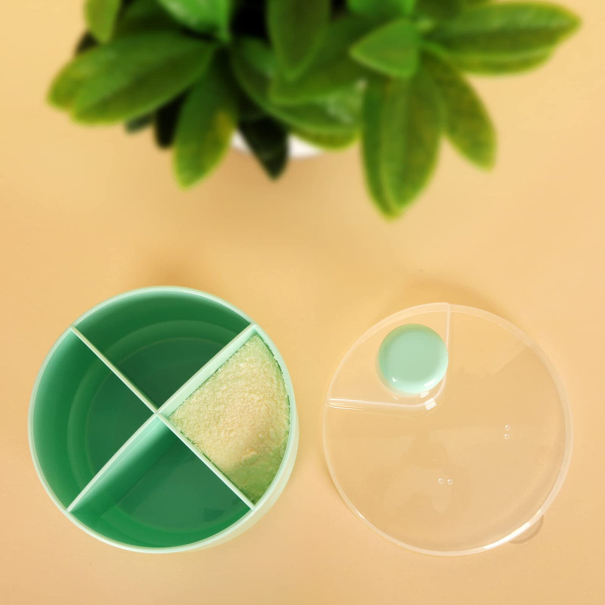 Accmor rotating snack container two pack set in green color for toddlers.