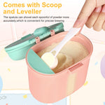 Pink Accmor portable travel dispenser being used to prepare a clean baby bottle