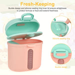 Compact Accmor infant feeding container stored alongside baby accessories for outdoor trips