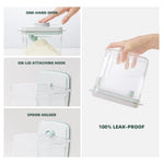 BPA free baby milk powder container with one hand pop top lid operation close up