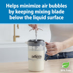 Close-up of the adjustable stopper on the Dr. Brown's baby pitcher designed to prevent air bubbles during milk preparation.