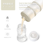 Termichy BPA free milk powder dispenser being poured into a standard baby bottle without spills