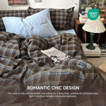 Close up view of the premium brushed microfiber material highlighting the soft texture and precise stitching of the checkered bedding
