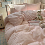 Reversible double sided pattern of the pink and white gingham check duvet cover.
