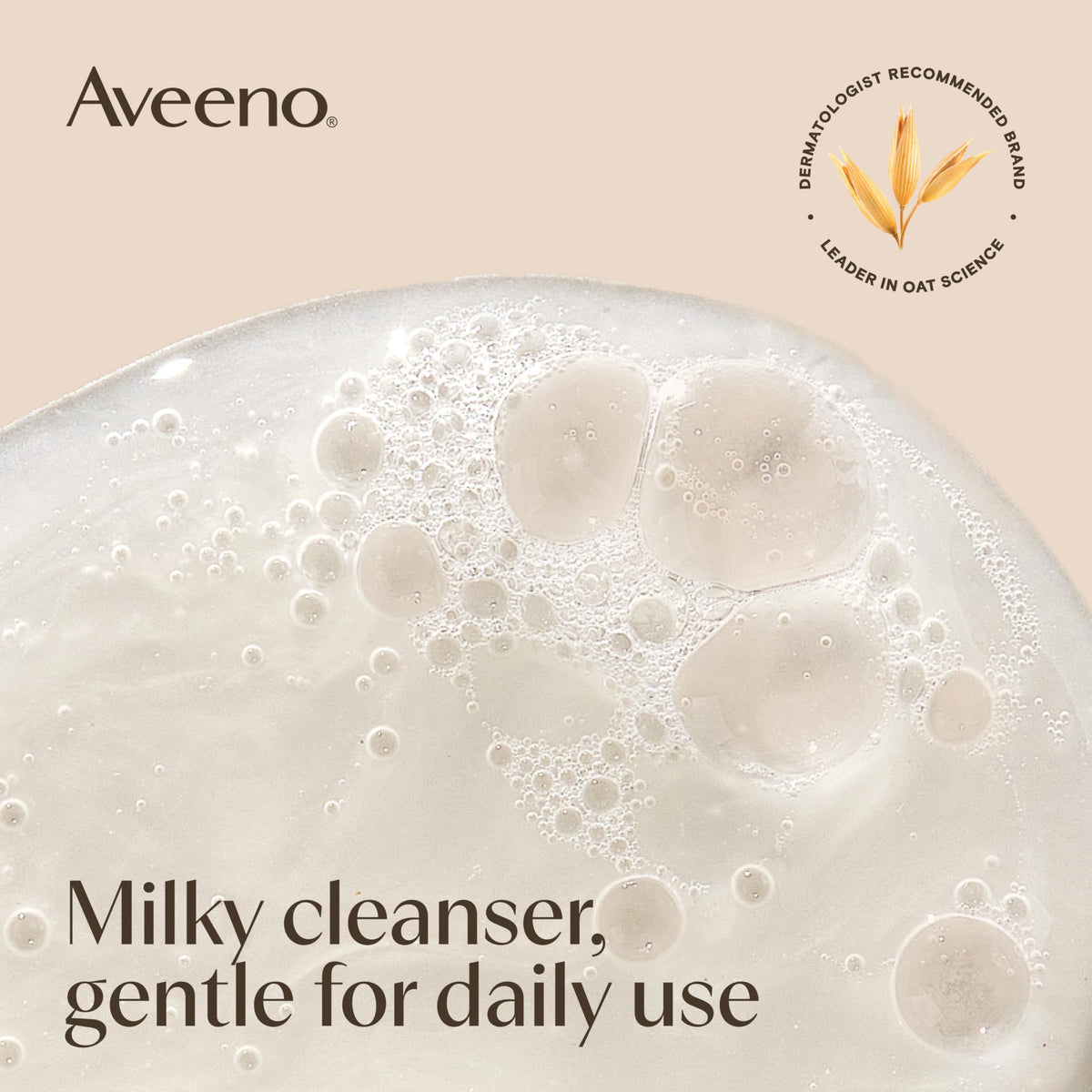 Texture shot of the milky non foaming gel consistency of Aveeno Nourishing Oat Cleanser