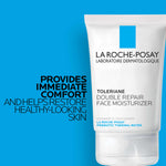 Applying Toleriane Double Repair face moisturizer to the cheek