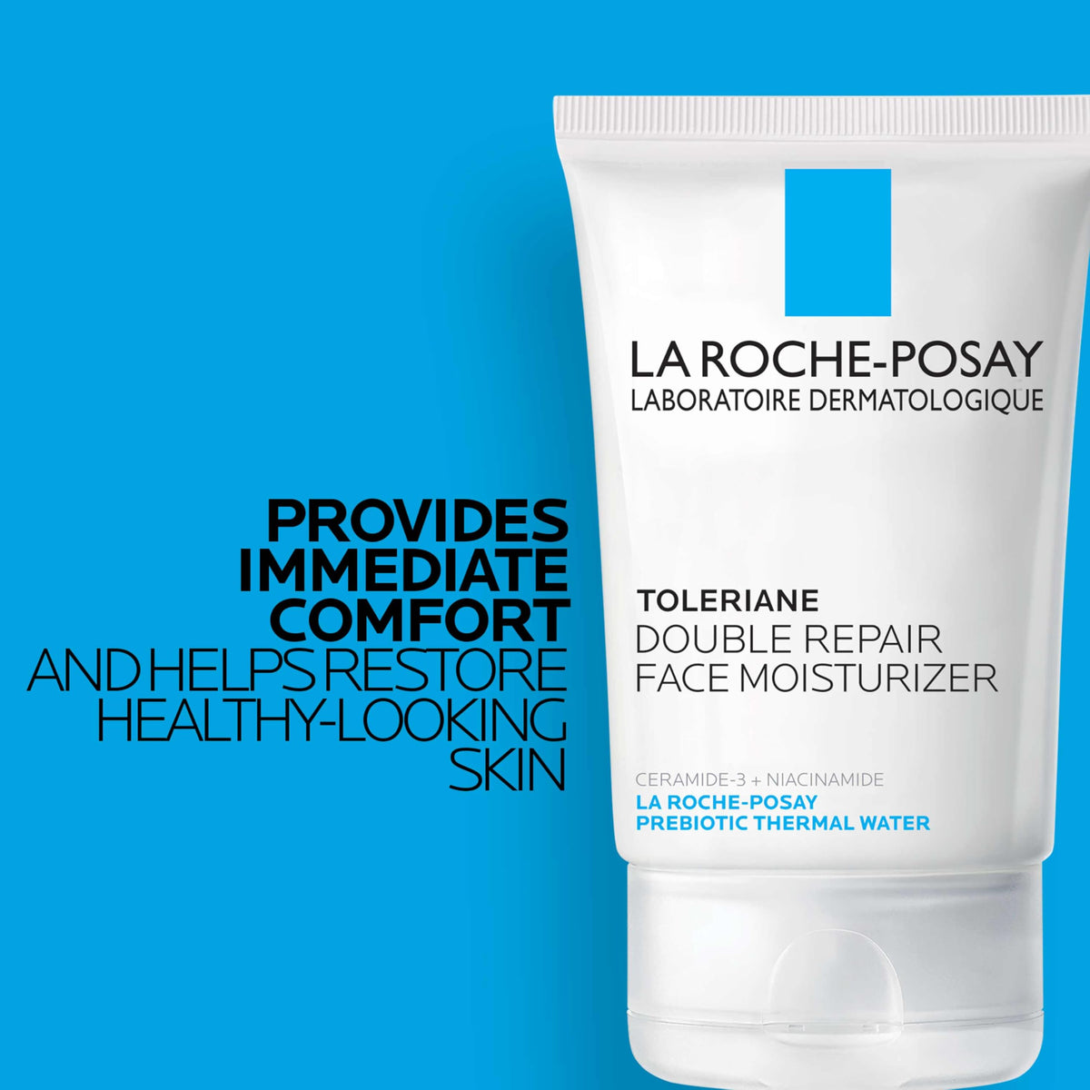 Applying Toleriane Double Repair face moisturizer to the cheek