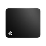 SteelSeries QcK Edge Medium mouse pad alongside a gaming mouse demonstrating actual sizing scale