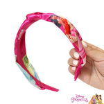 Thick hair accessory for girls highlighting the top knotted style and detailed princess graphics.