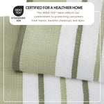 Folded desert sage and moss green cotton bath sheets
