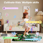 Children playing on a green dinosaur themed dance pad