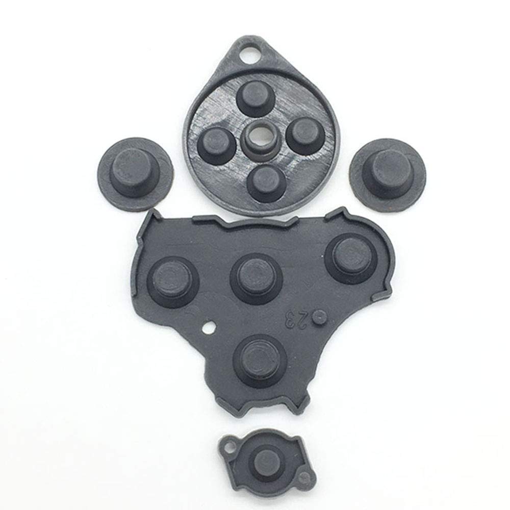 Grey conductive silicone rubber keypad component showing conductive carbon pills.