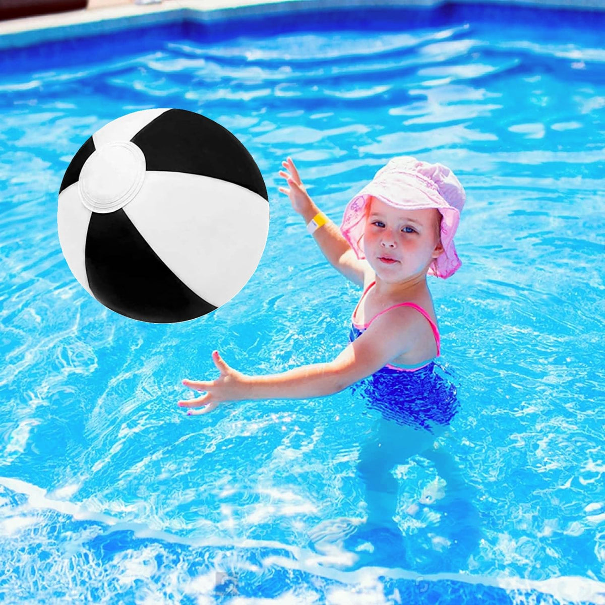 Close up view of the durable inflation valve on a classic black and white large beach toy