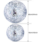 Three pieces of clear Hsei party balls floating on water with sparkling silver sequins.