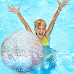 Durable silver confetti inflatable beach toy set being inflated for a wedding event.