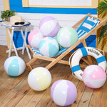 MiniInflat macaron color inflatable balls floating in a swimming pool as elegant tropical event decorations.