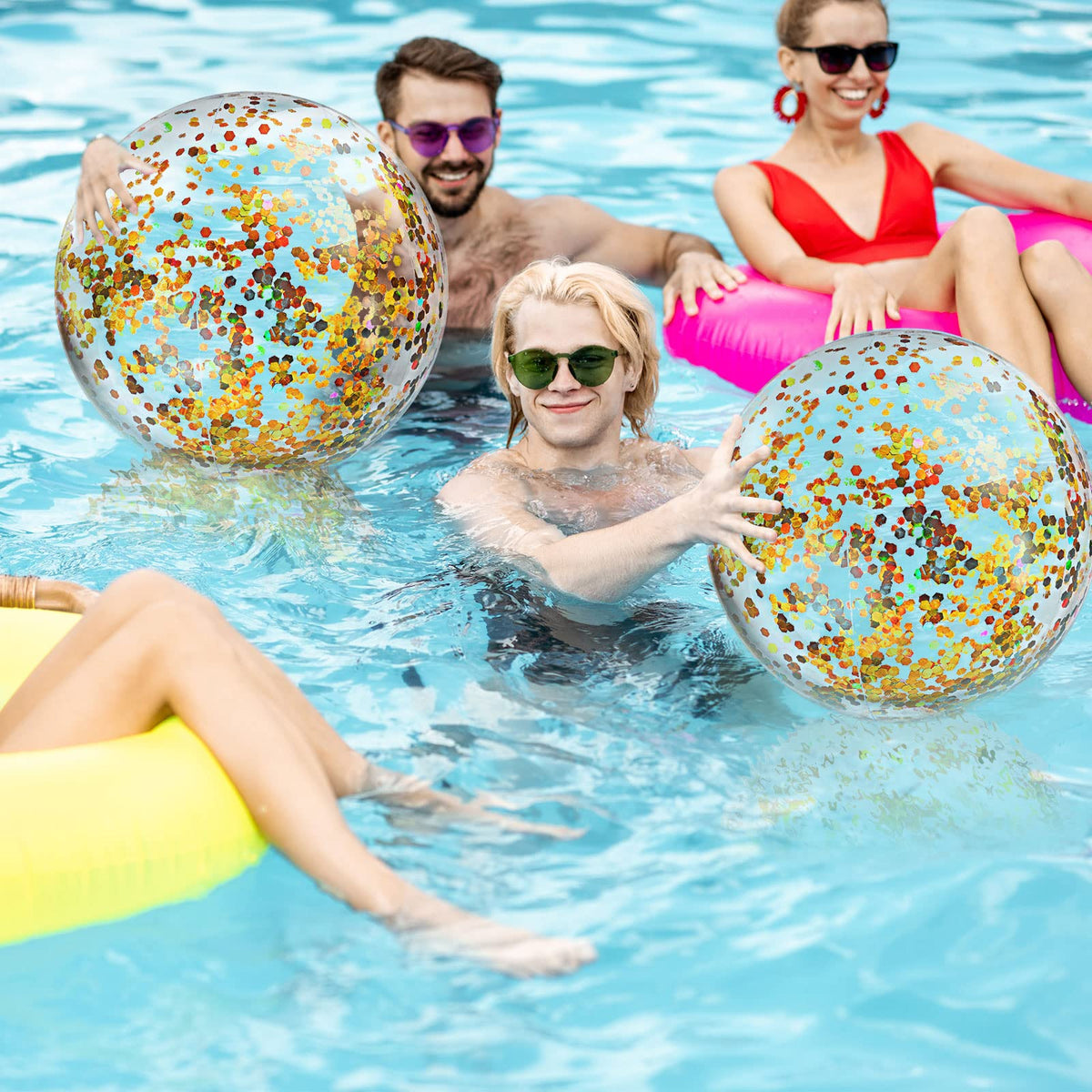 Civaner clear glitter beach ball set used as elegant outdoor wedding reception decor.