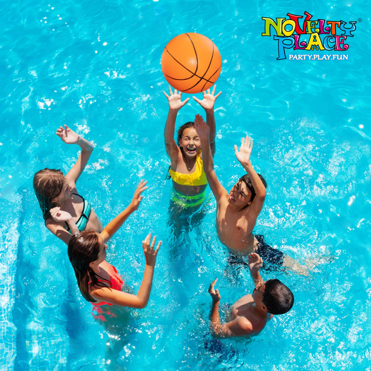 Three pack of Novelty Place sports themed inflatable beach balls floating on water