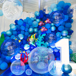 Sratte 24 inch large clear inflatable ball being held by an adult for size reference
