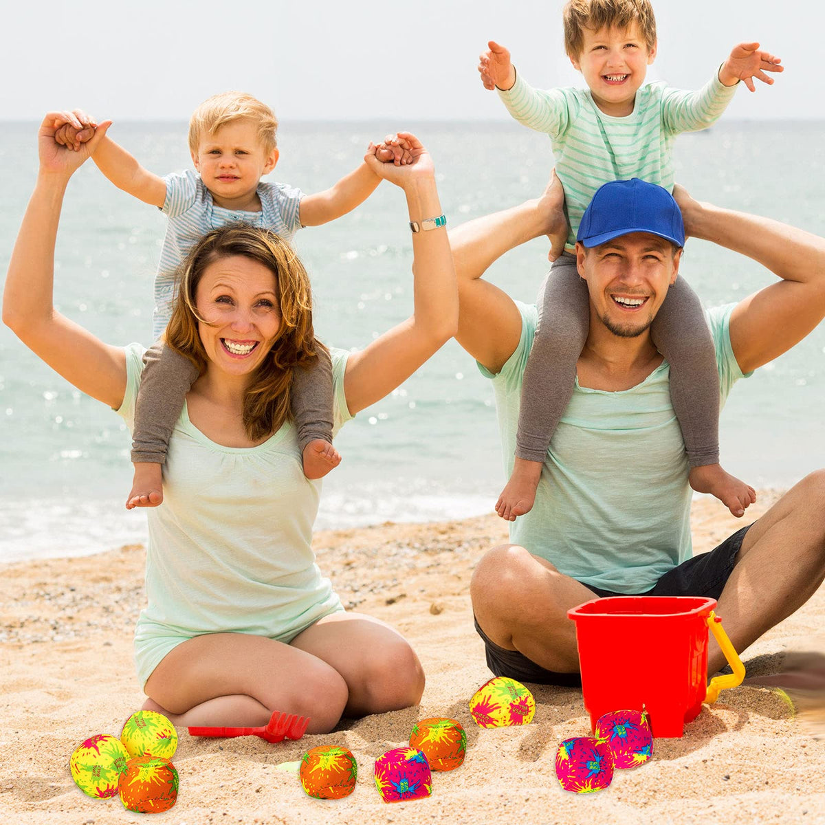 Soft sponge core water splash balls soaking up water in a colorful bucket