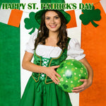 Deflated and folded AXBMM shamrock pattern beach balls showcasing compact storage design