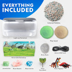 All inclusive components of the Blue Marble science kit laid out including sand bags, pebbles, and reversible backdrop.