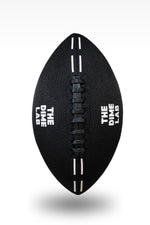The Dime Lab Water Football side profile displaying the raised textured double laces and professional athletic build.