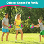Two blue and green paddles alongside two pink and green paddles from the JIGQGY family outdoor game.