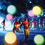 Illuminated purple and green glowing spheres floating near pool steps for ambient summer decor