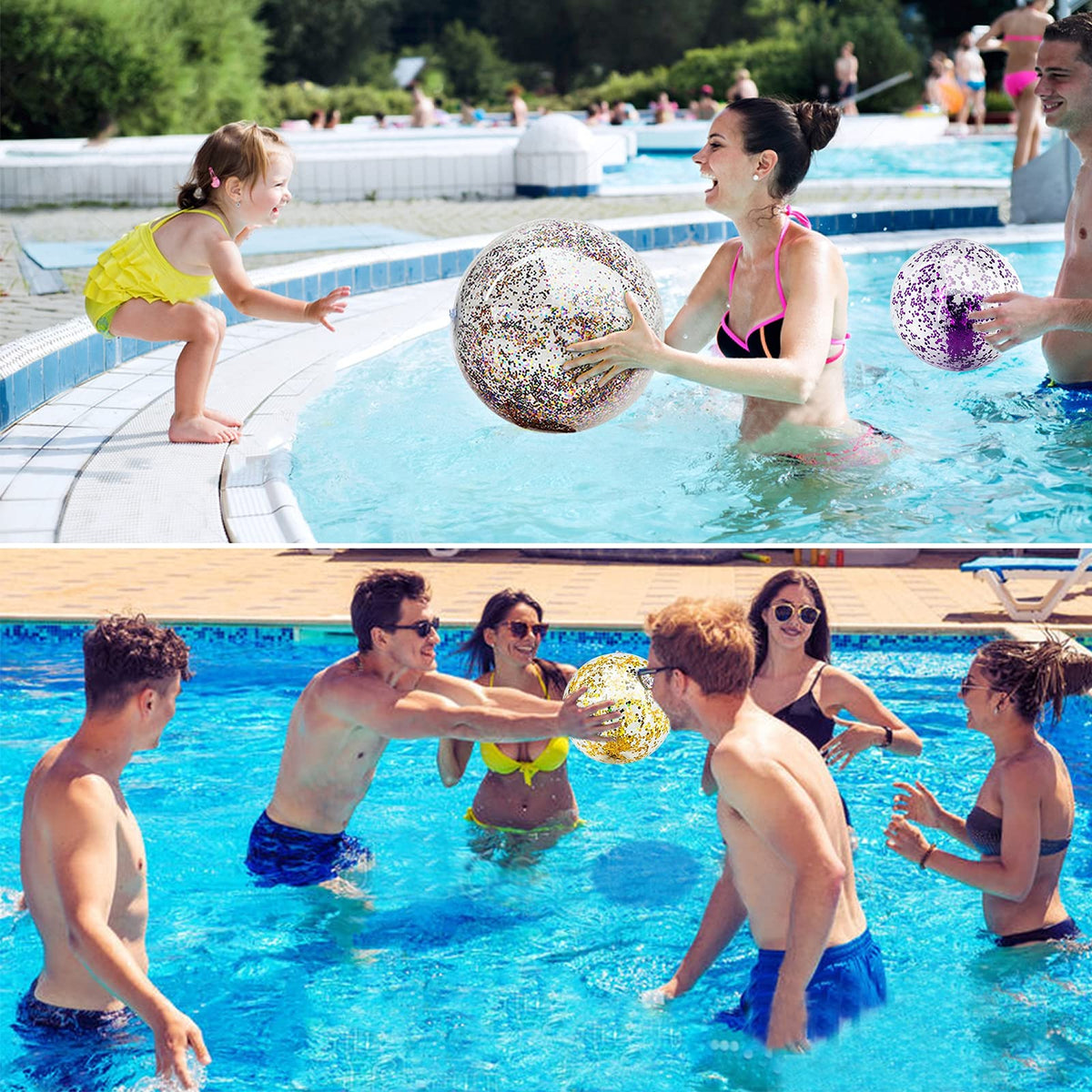 Two twenty four inch and three sixteen inch transparent sequin blow up balls displayed on grass